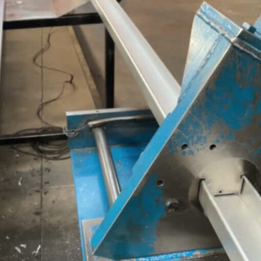 Cutting process for 51mm drywall stud at a local manufacturing facility.