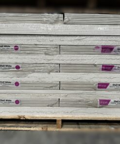 A stack of Siniat Etex 12mm White Vinyl Ceiling Tiles wrapped in plastic, with labels showing